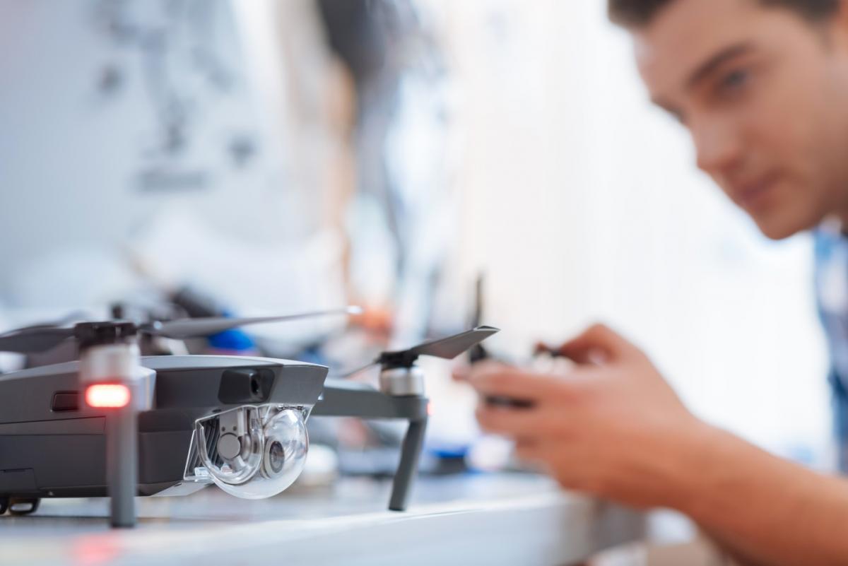 A student experiments with a drone