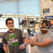 astronautical engineering students working in fusion lab