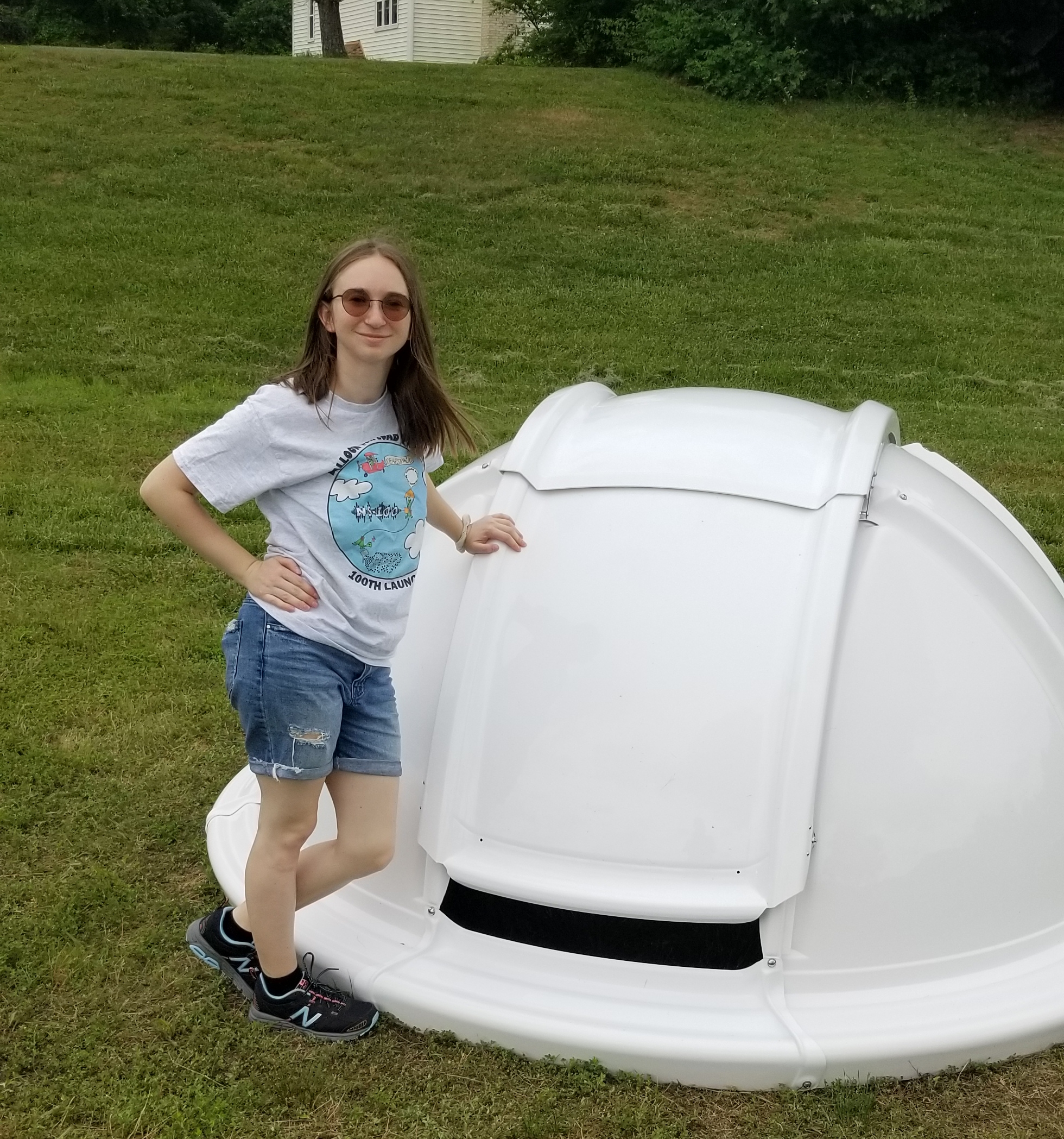 ALPHA Summer Intern Julianna Reese poses with assembled observatory dome