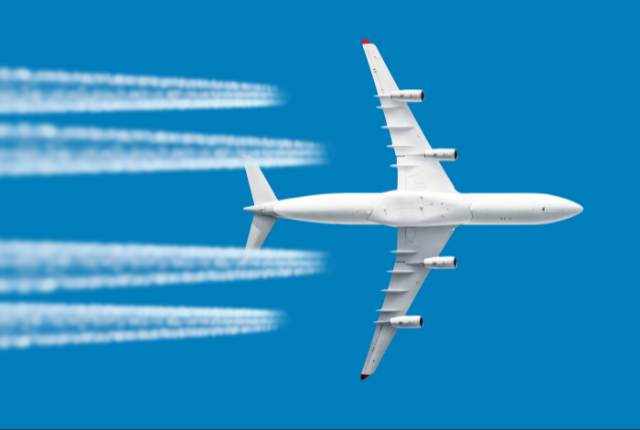 airplane with contrails