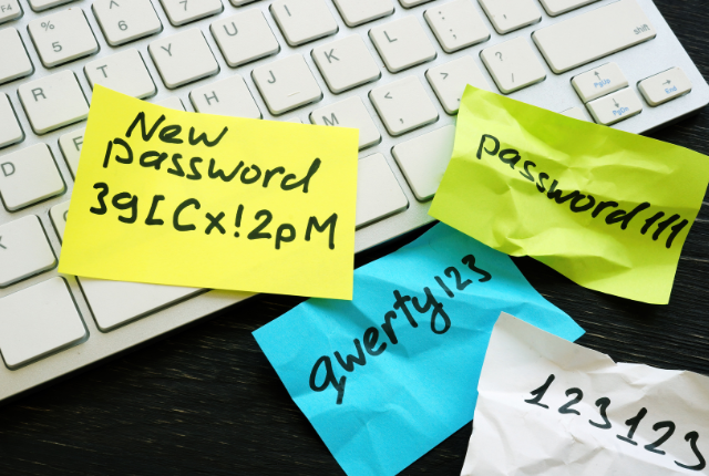 passwords written on post it notes on keyboard