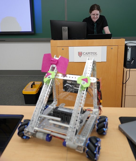 Capitol Scholar Program participant presenting space robot