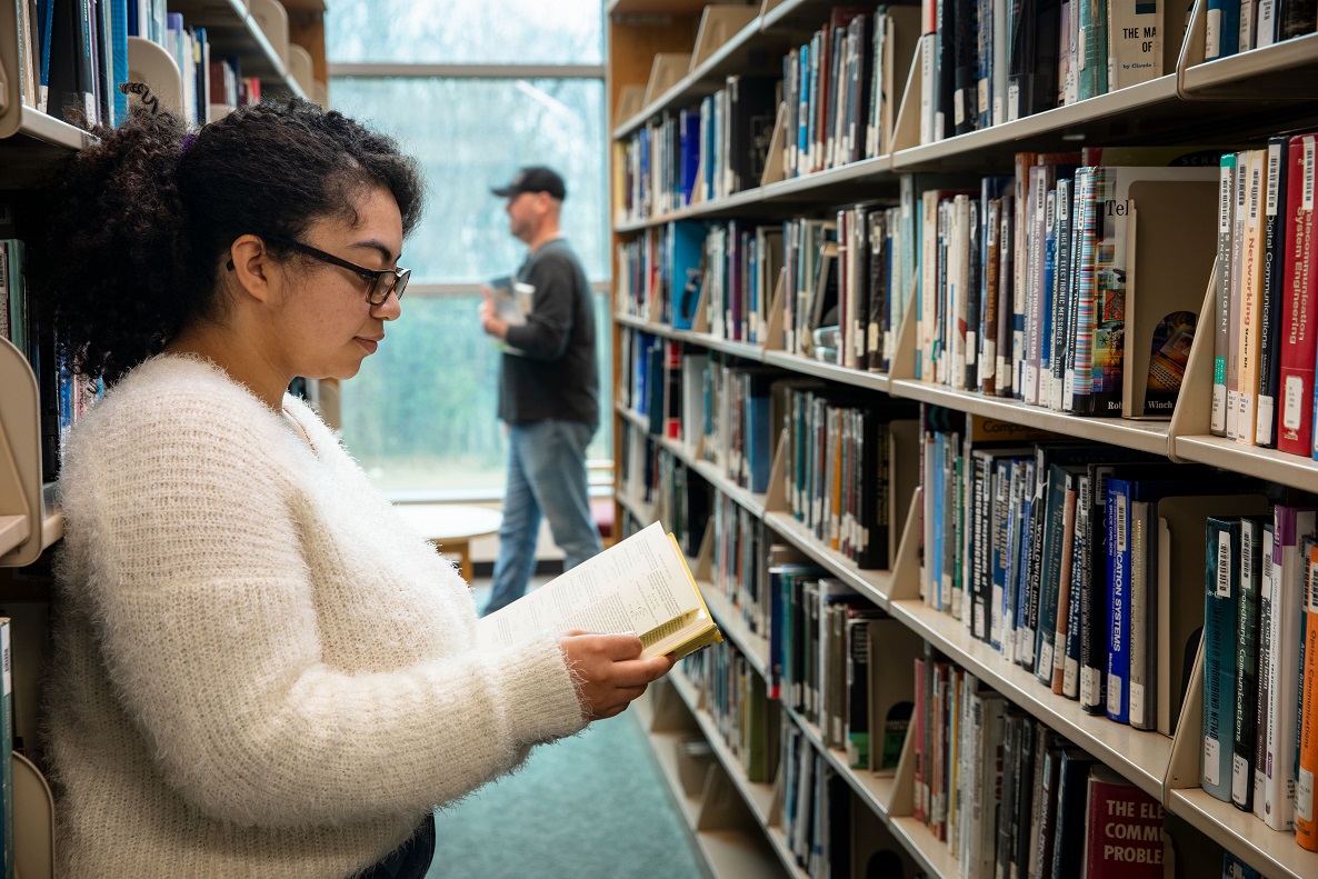 Capitol Tech Students in Library Stacks
