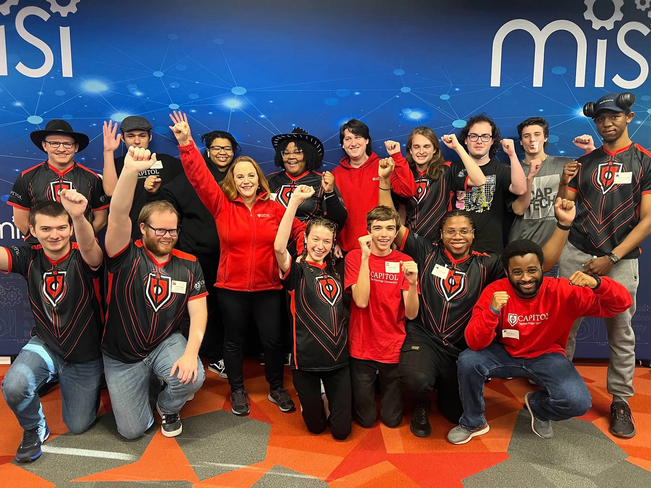 Dr. Diane Janosek grouped with Capitol Tech eSports team