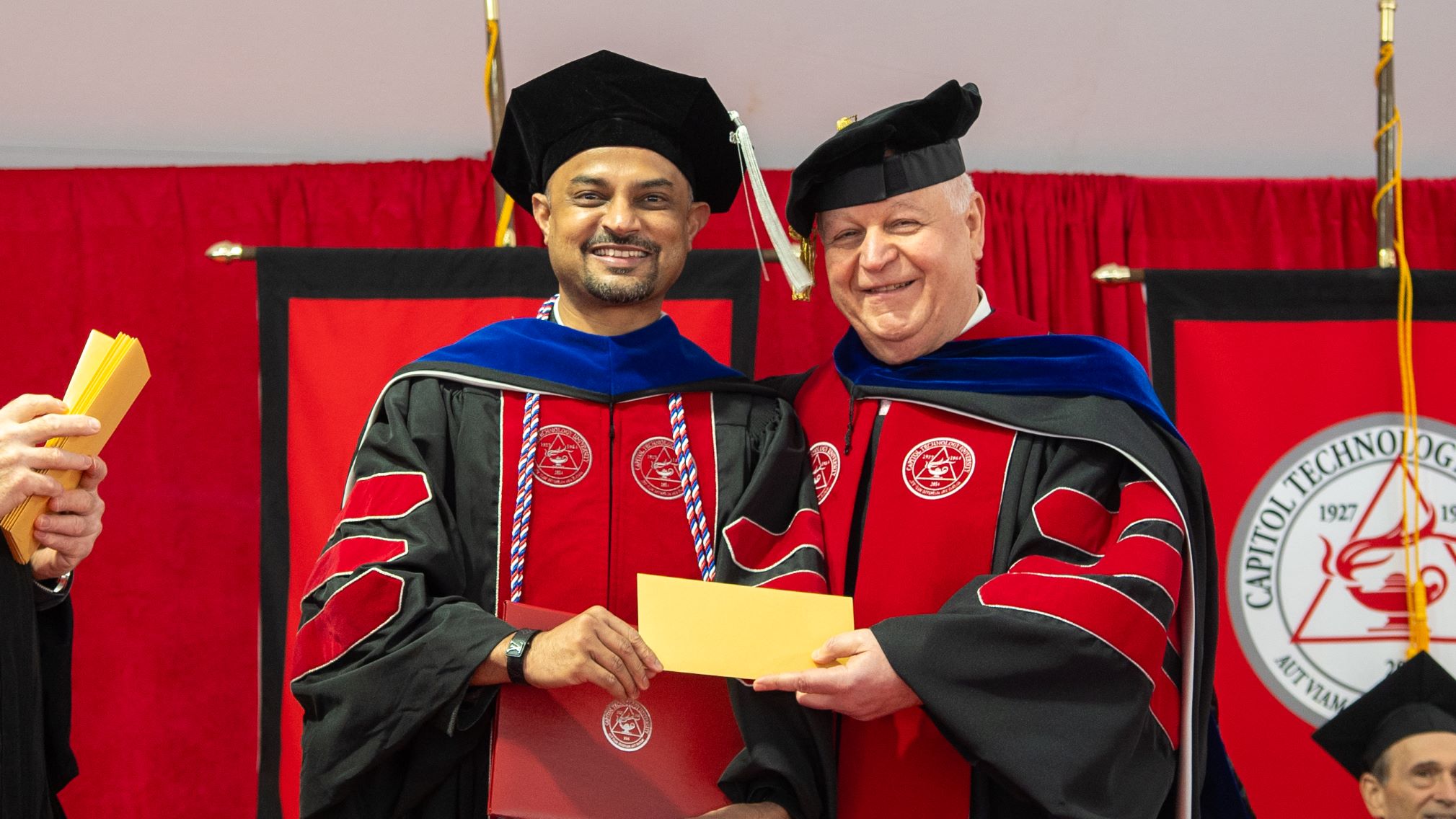 Dr. Ghaffarian with Capitol Tech graduate