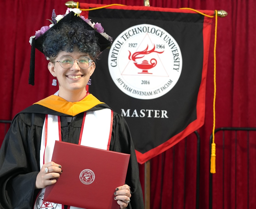 Elliot Elios graduated with their Master of Research in Cyberpsychology during Capitol's 2025 Commencement / Photo Credit: Juliana Walter