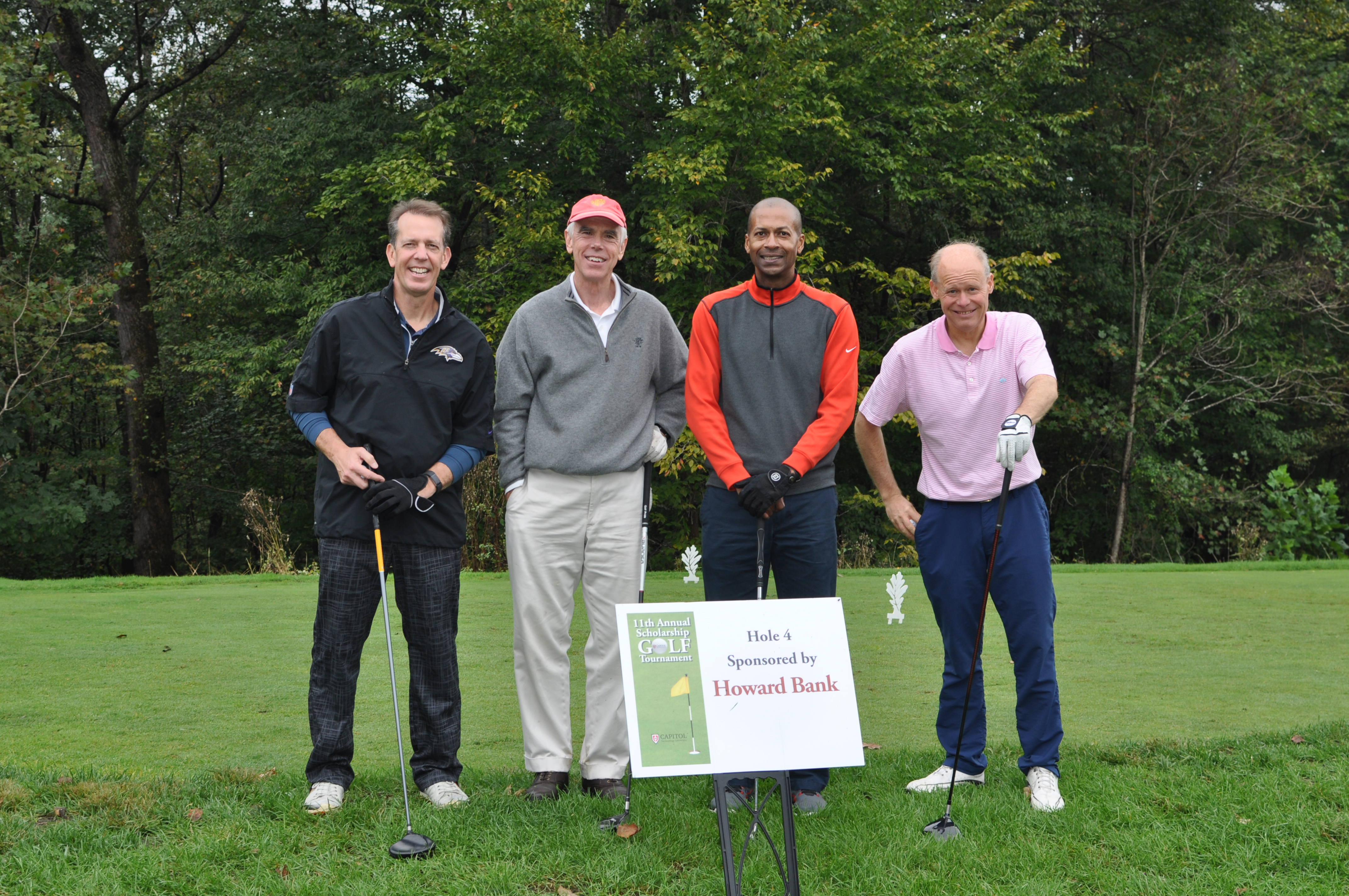 Howard Bank golf team with sponsored hole