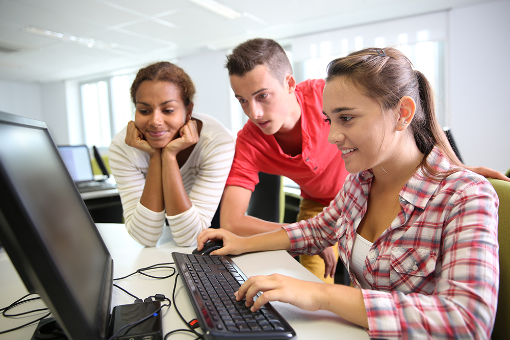 Stock photo depicting young coders