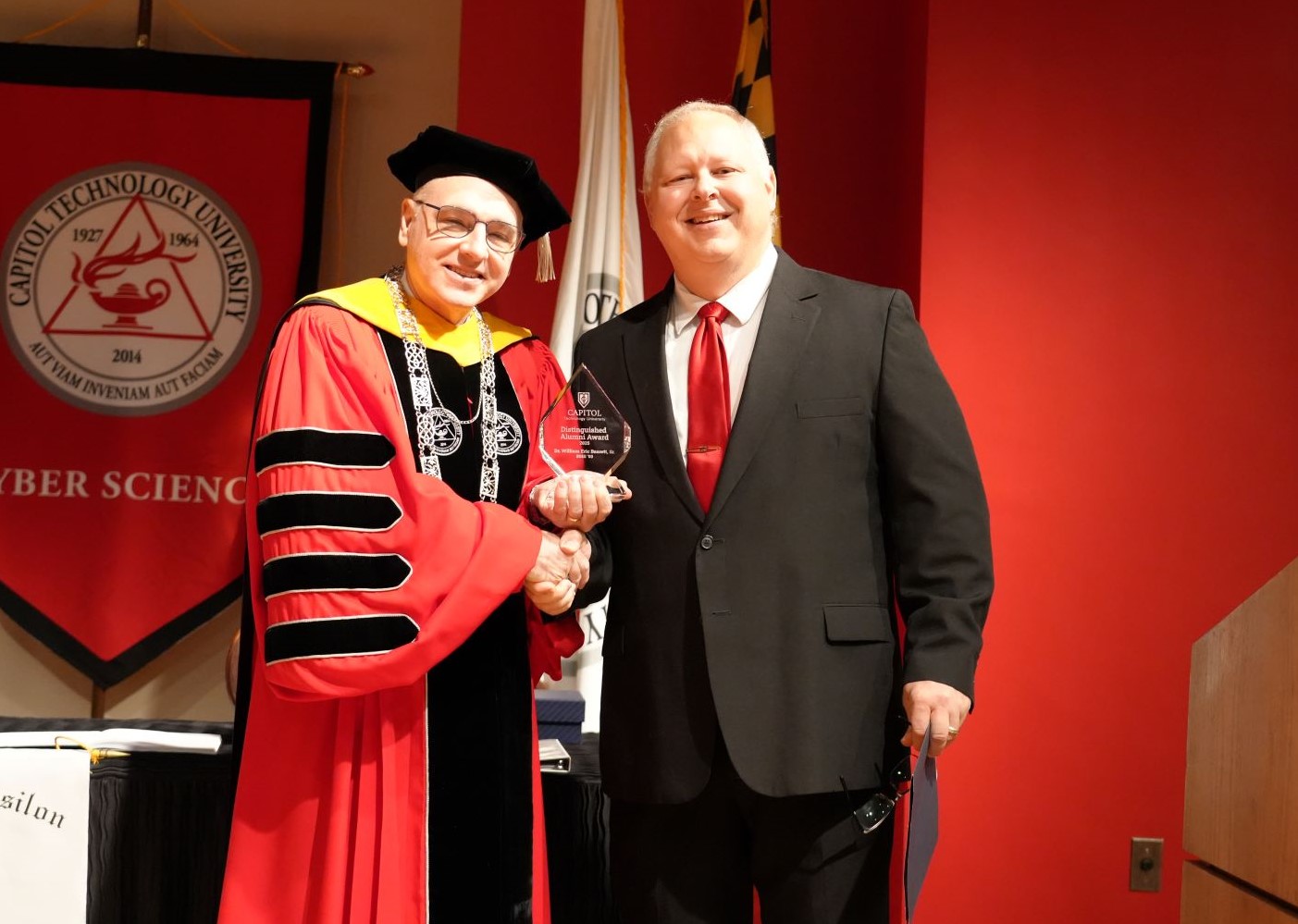 President Sims with Dr. William Bassett