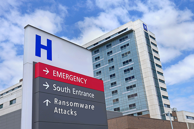 the sign in front of hospital building points to the emergency entrance and ransomware attacks on hospitals