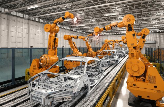 Mechatronics robots working on automotive assembly line