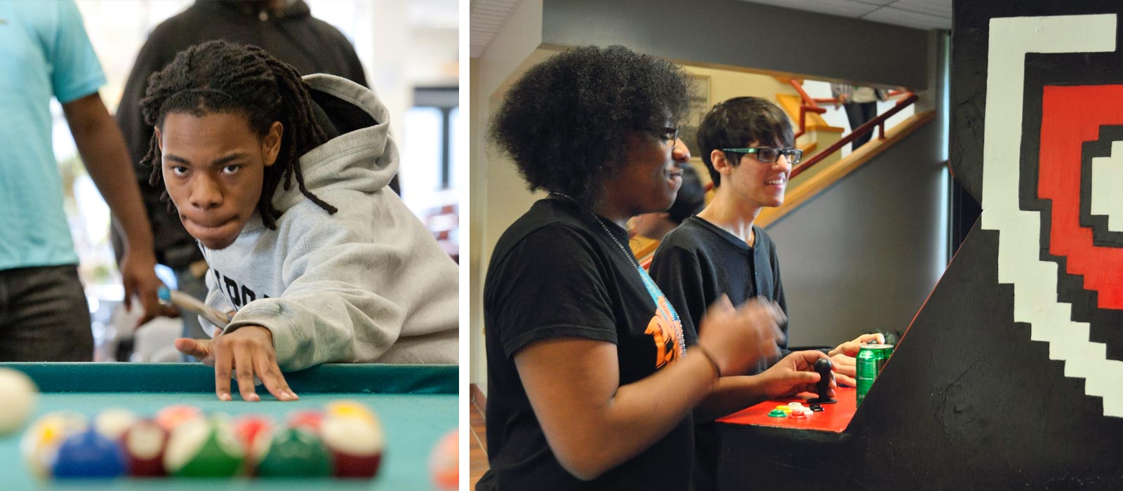 students playing pool and arcade machine