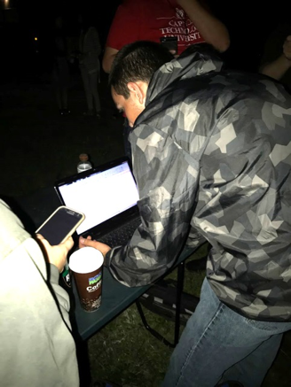 students controlling a satellite with a mobile phone