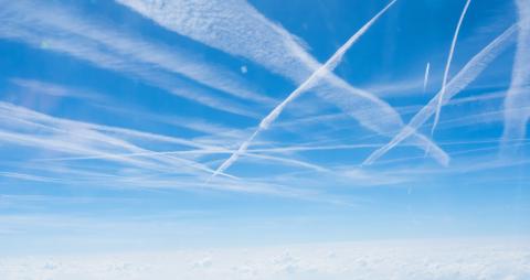 contrails in blue sky