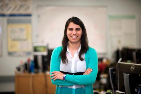 a portait of professor garima bajwa in front of a classroom