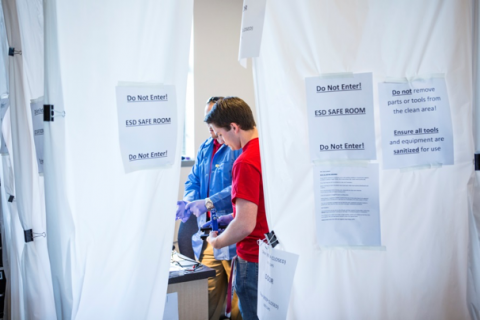 Astronautical Engineering Students work on project in ESD safe room