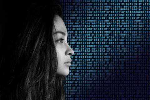 girl in front of binary background